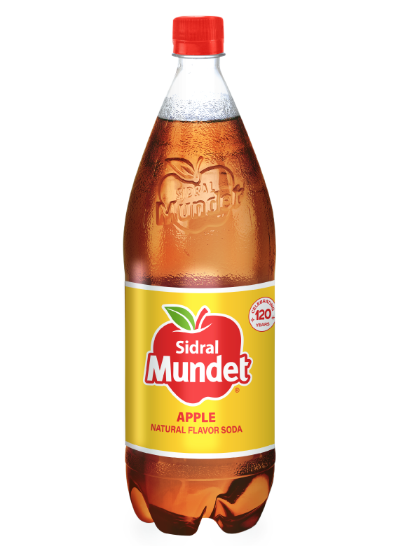 2-liter bottle of Sidral Mundet Apple soda with signature red cap, yellow label, and embossed apple logo—celebrating over 120 years of natural apple flavor and Mexican heritage.